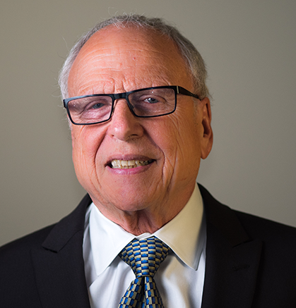 Man in glasses and suit and tie