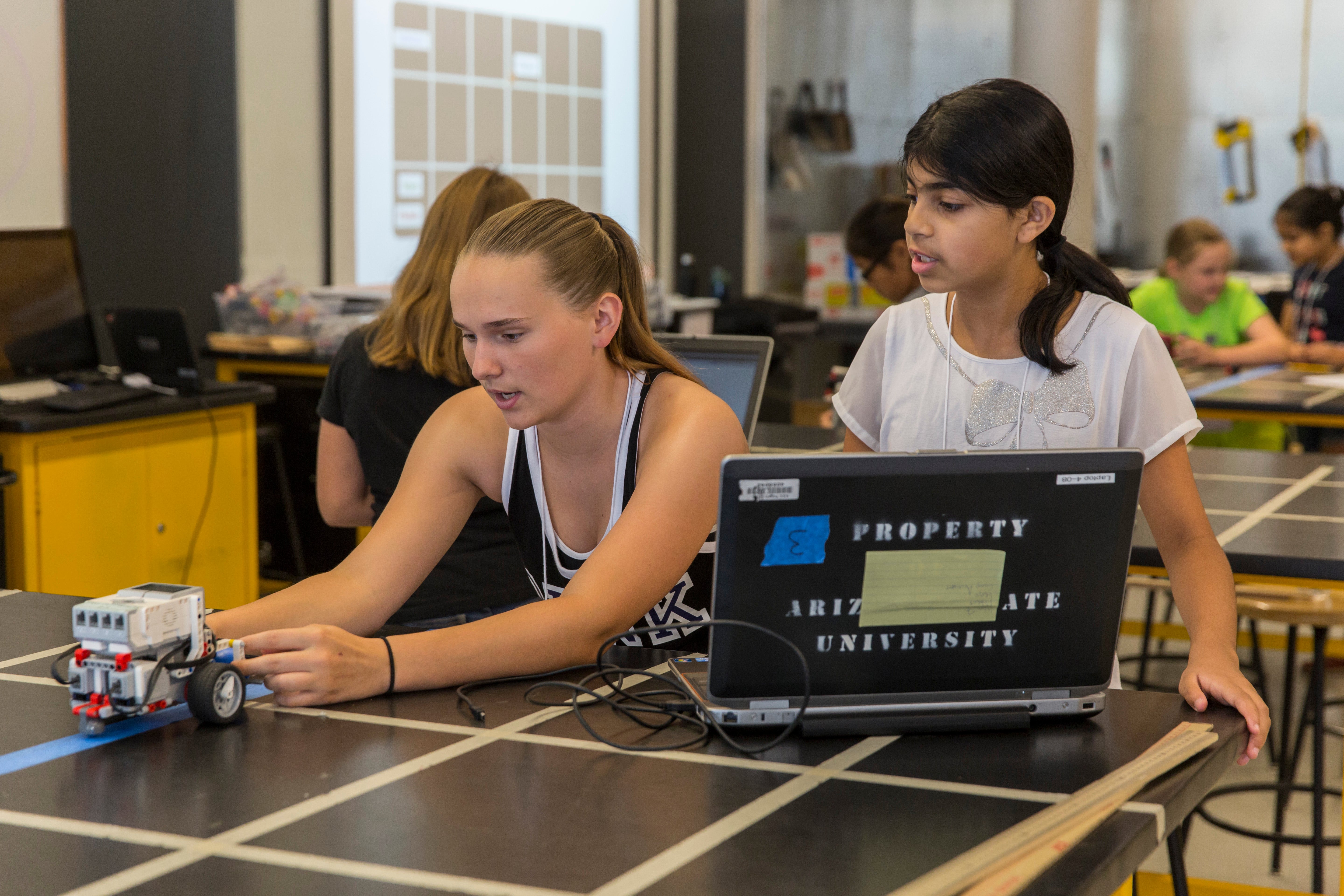 students working with LEGOs