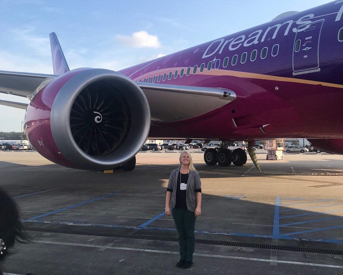 Rebecca Muenich in front of a Boeing 787 airplane