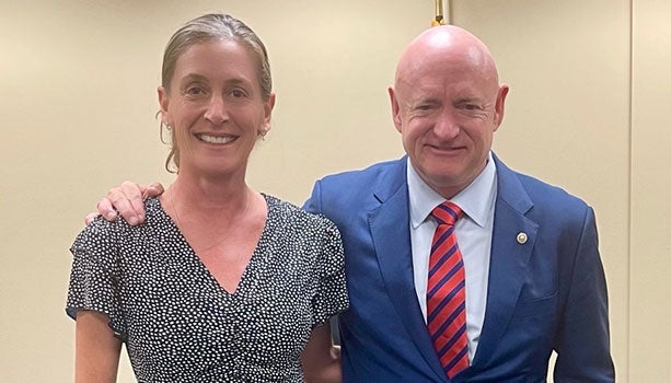 ASU Professor Leah Gerber with Sen. Mark Kelly.