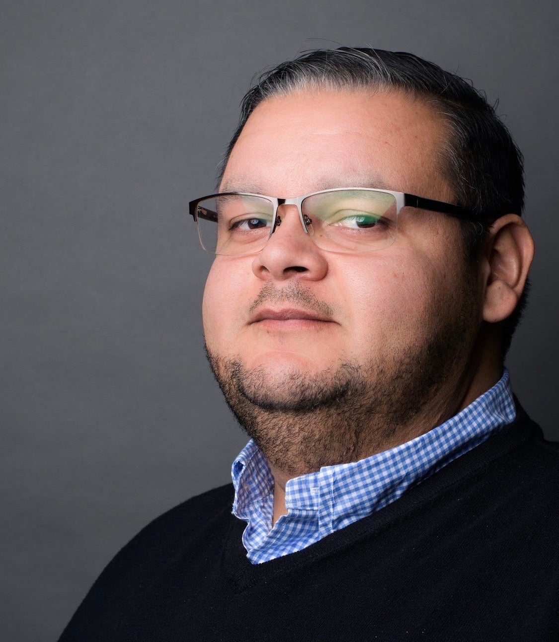 Man in glasses and sweater