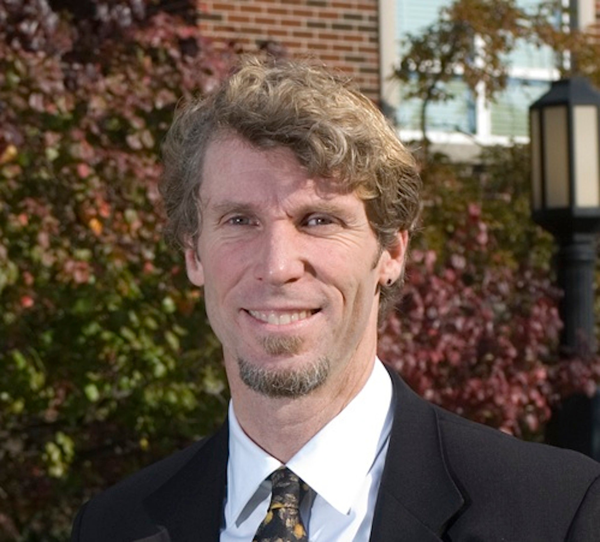 Man in tie smiling