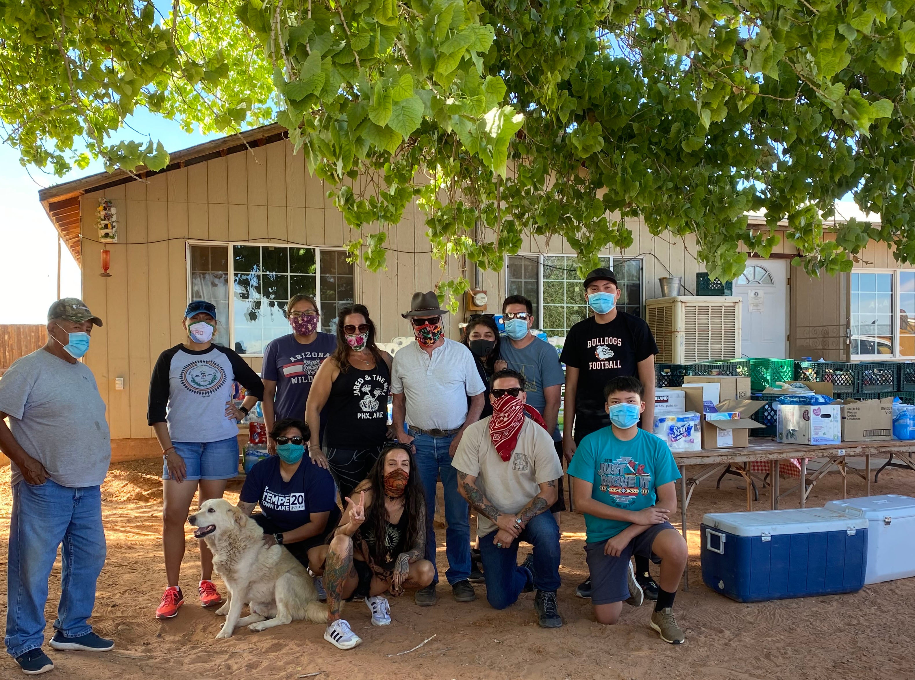 Volunteers outside home