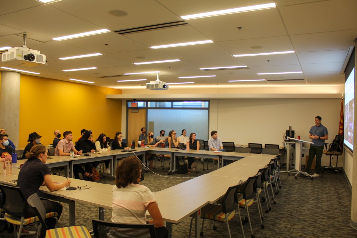 Arizona State University alum Robert Bond presenting to room full of faculty and students at Coor Hall