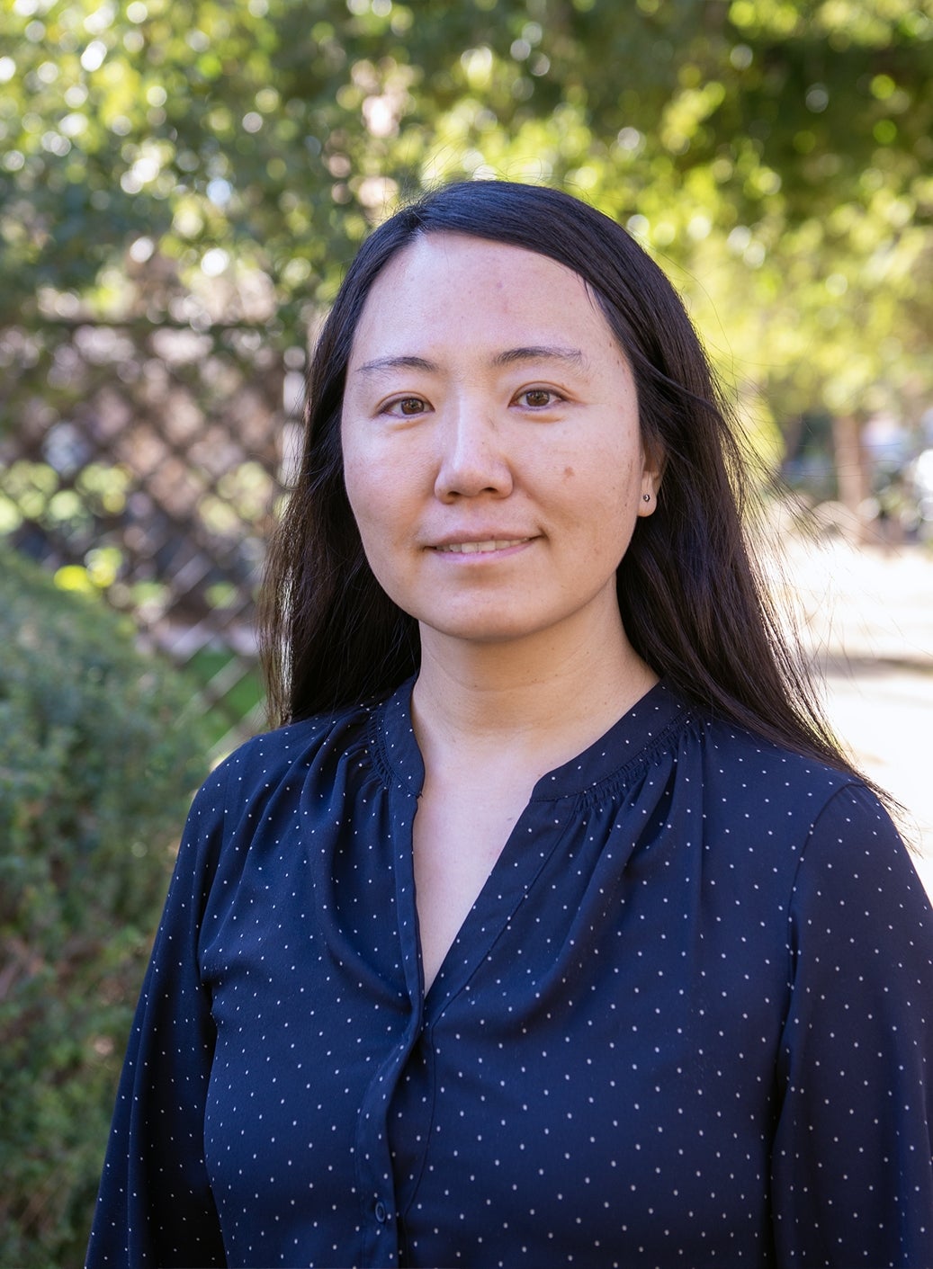 Headshot of Professor Jie Xu in an outdoor setting.