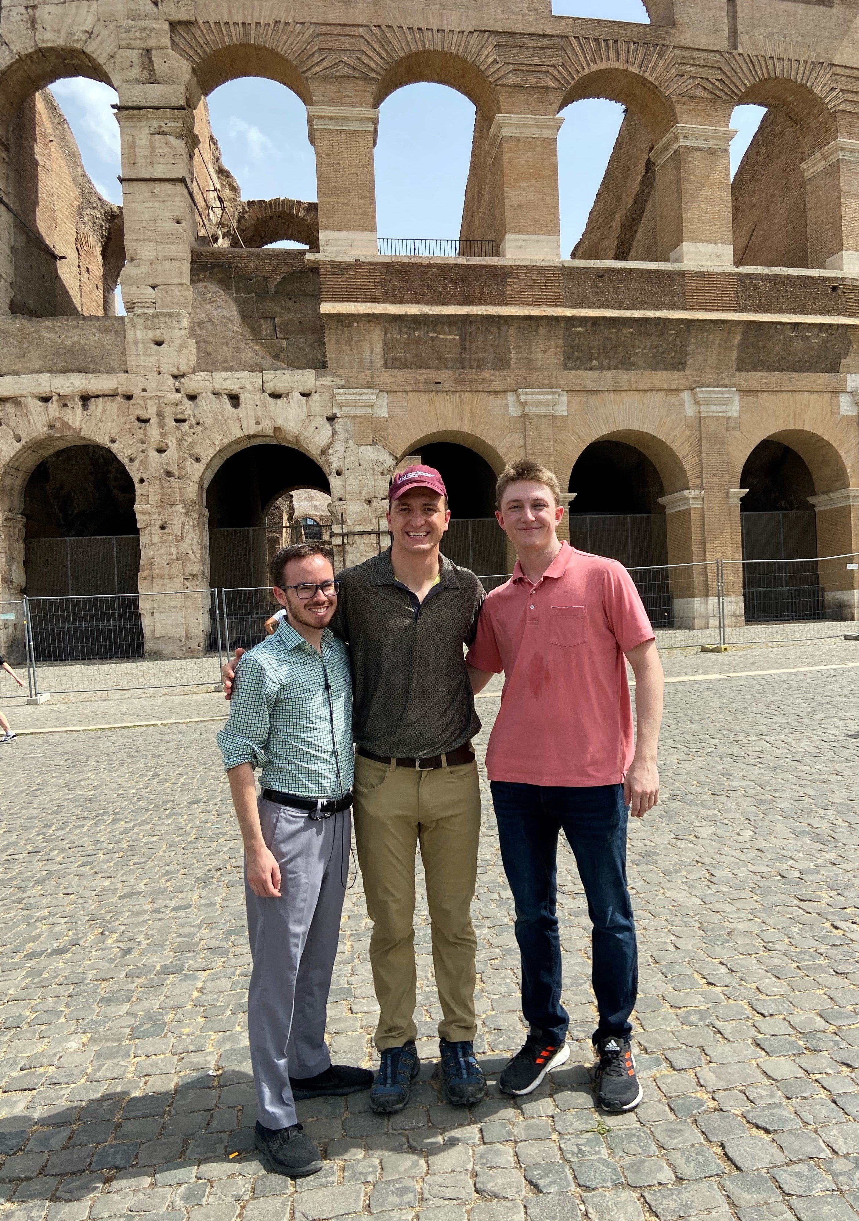 Jonathon Hofer (center) during a trip to Rome with his students.