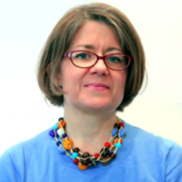 Woman in glasses and colored necklace