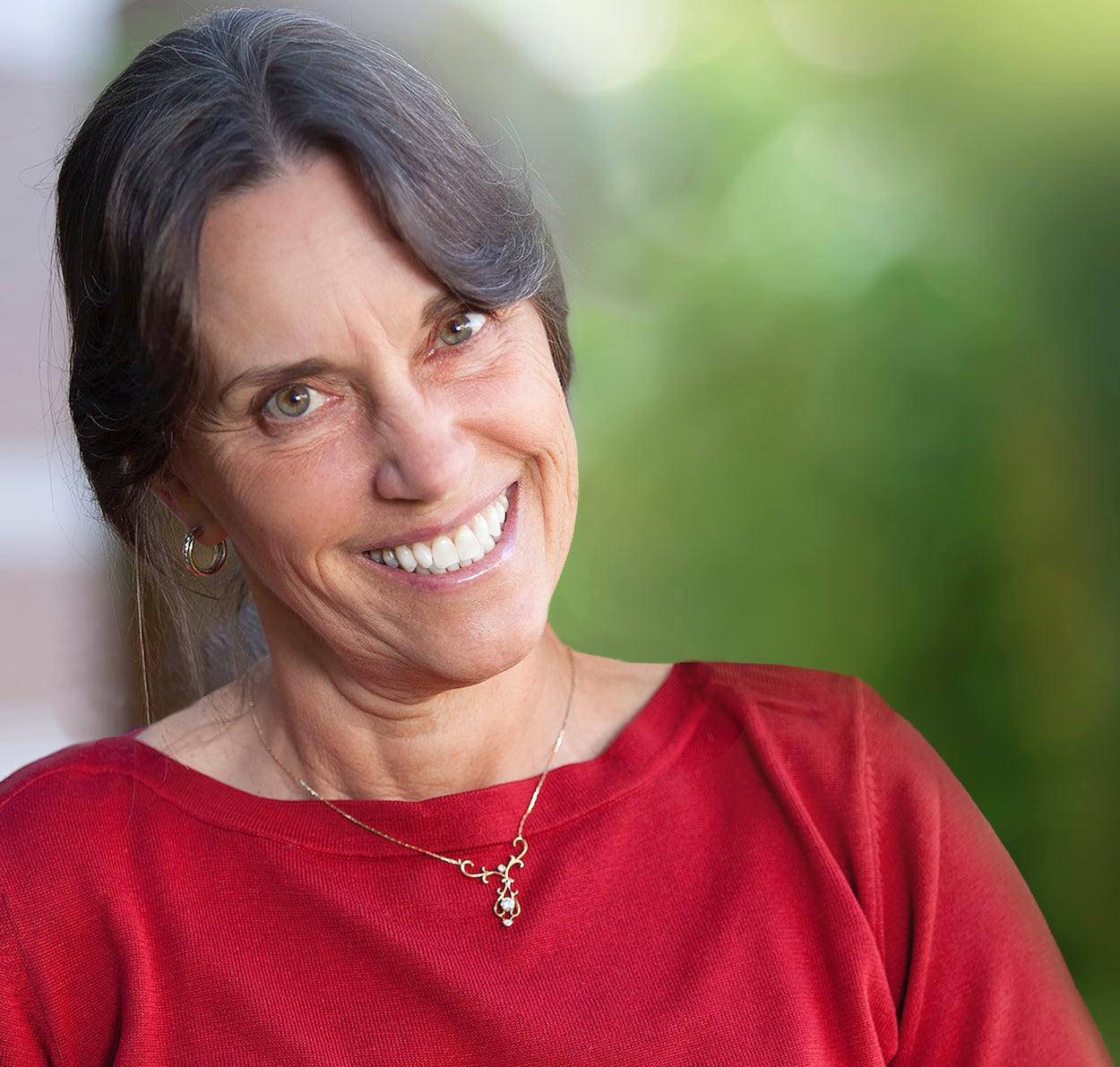 Woman in red shirt