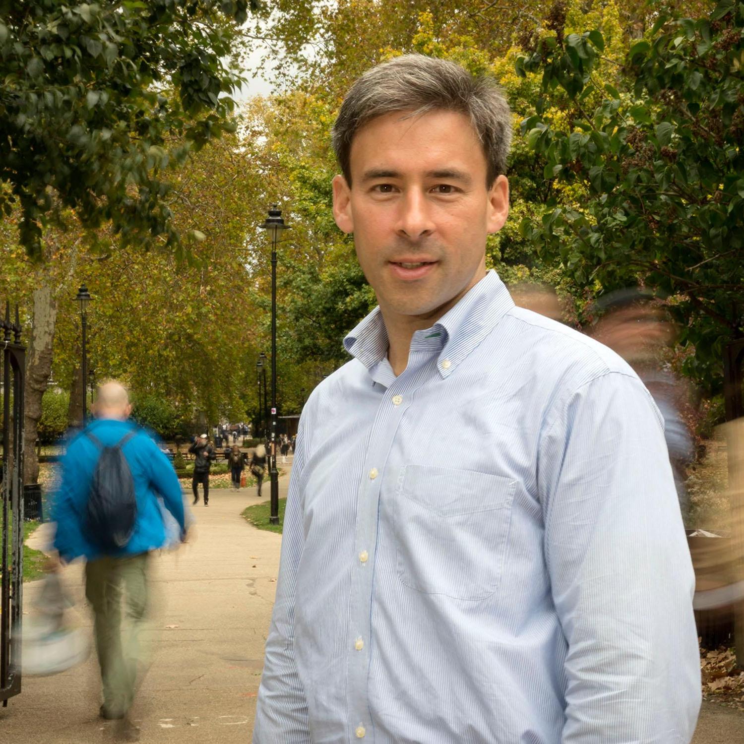 Eric Kaufmann at a park looking at the camera