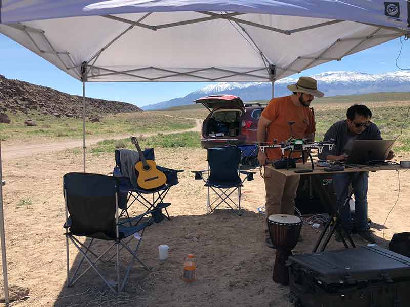 ASU students configure a drone for use in the field