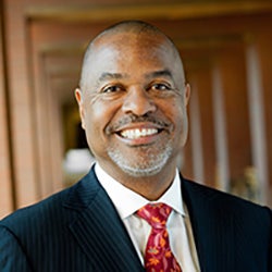 Man in red tie and suit