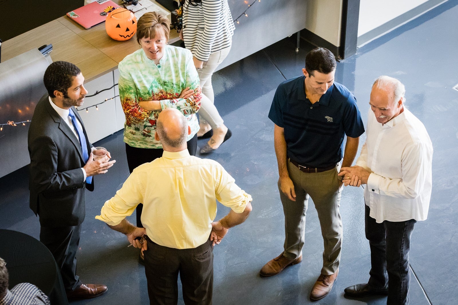 New ASU English chair Krista Ratcliffe talks with other ASU faculty and staff at the Ross-Blakley Hall open house on October 31, 2017 / Photo by Bruce Matsunaga