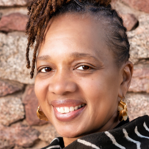 Woman in braids smiling