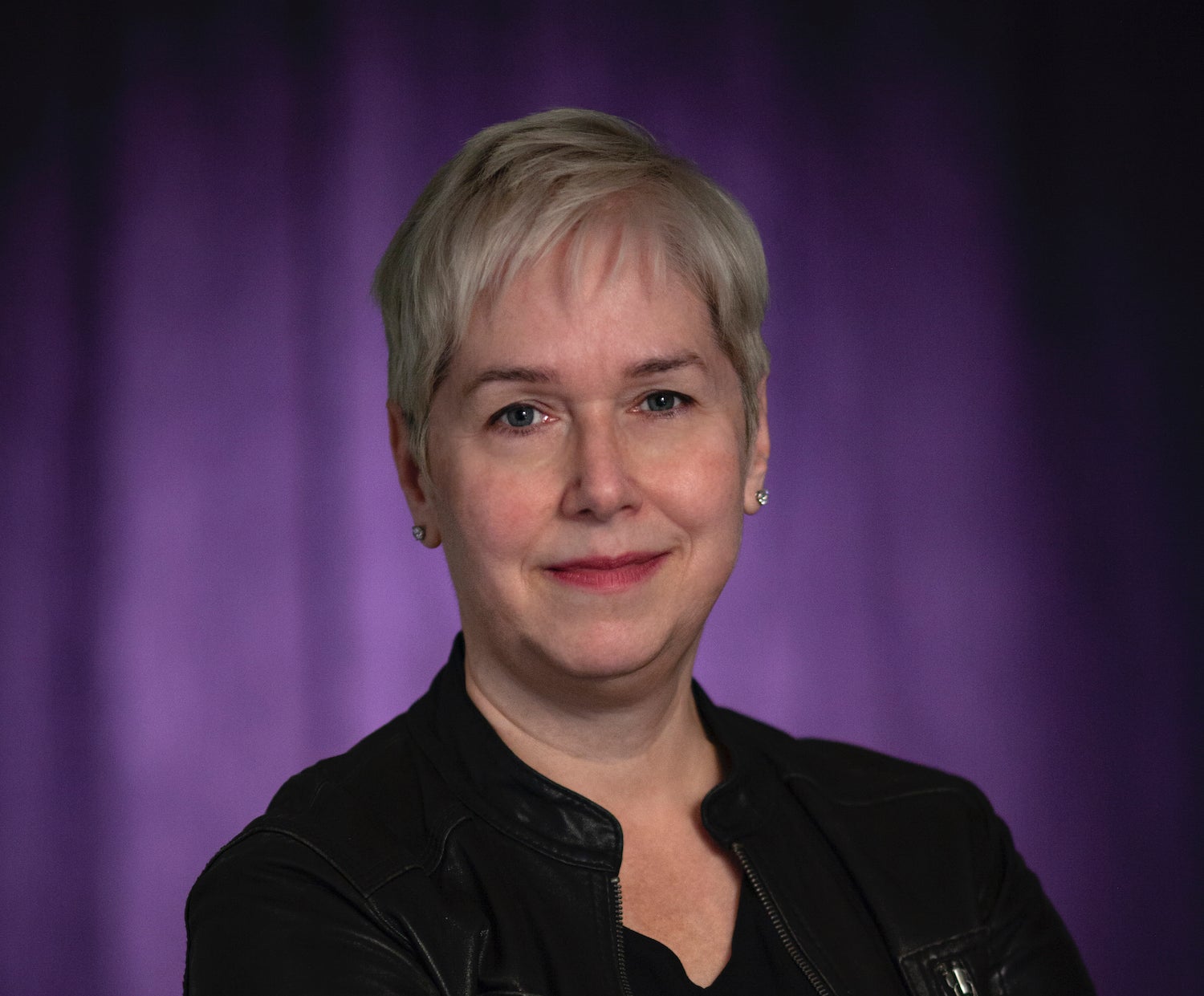 Woman with grey hair smiling