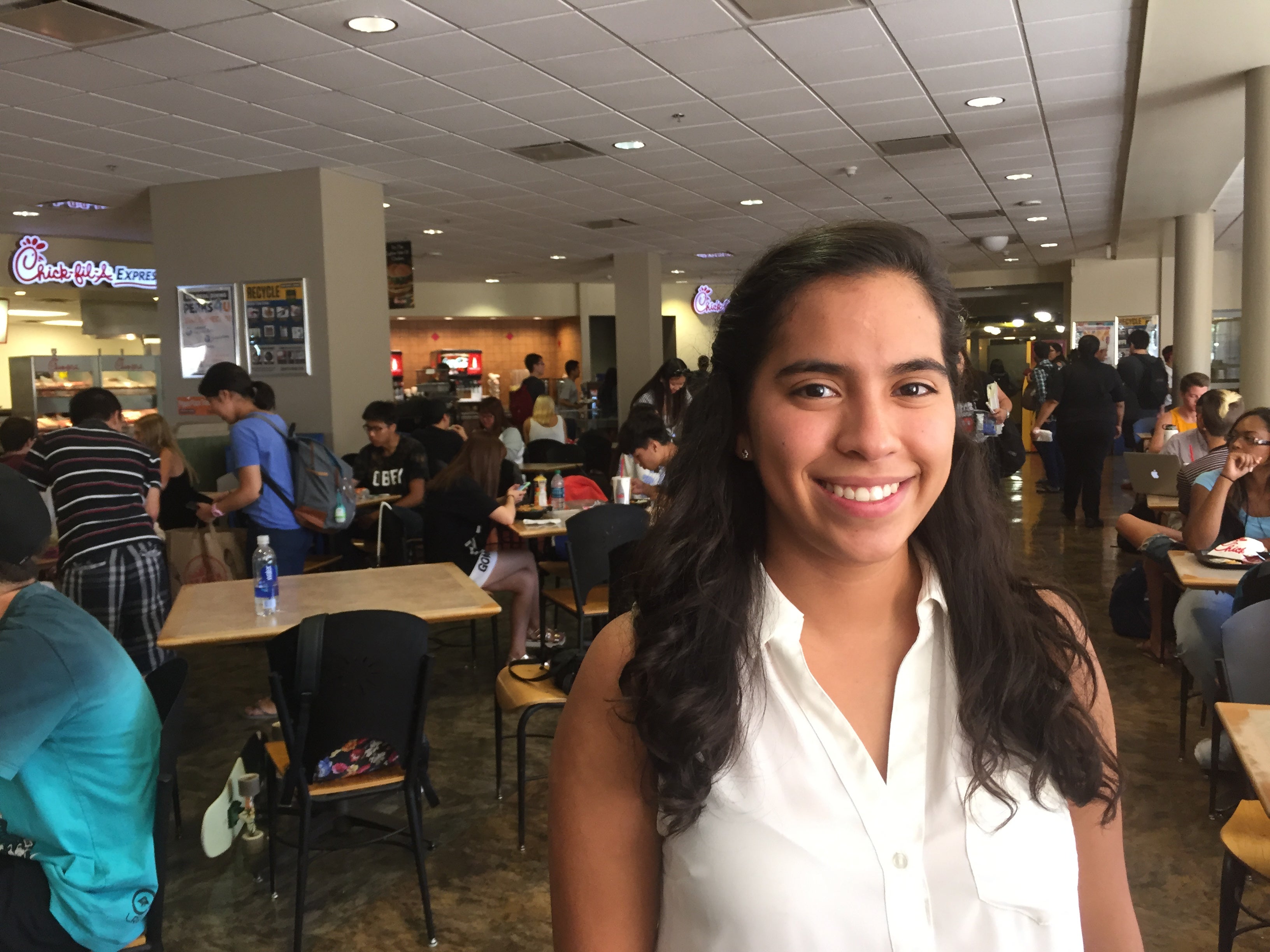 Woman standing in food court