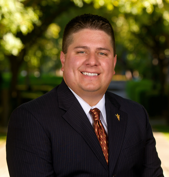 Man in black coat and ASU tie