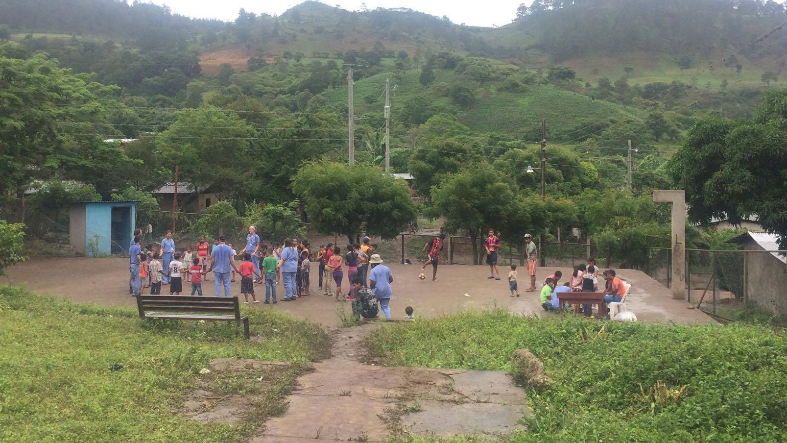 Volunteers play games with kids at a Mayo Clinic Global Medical Brigade clinic