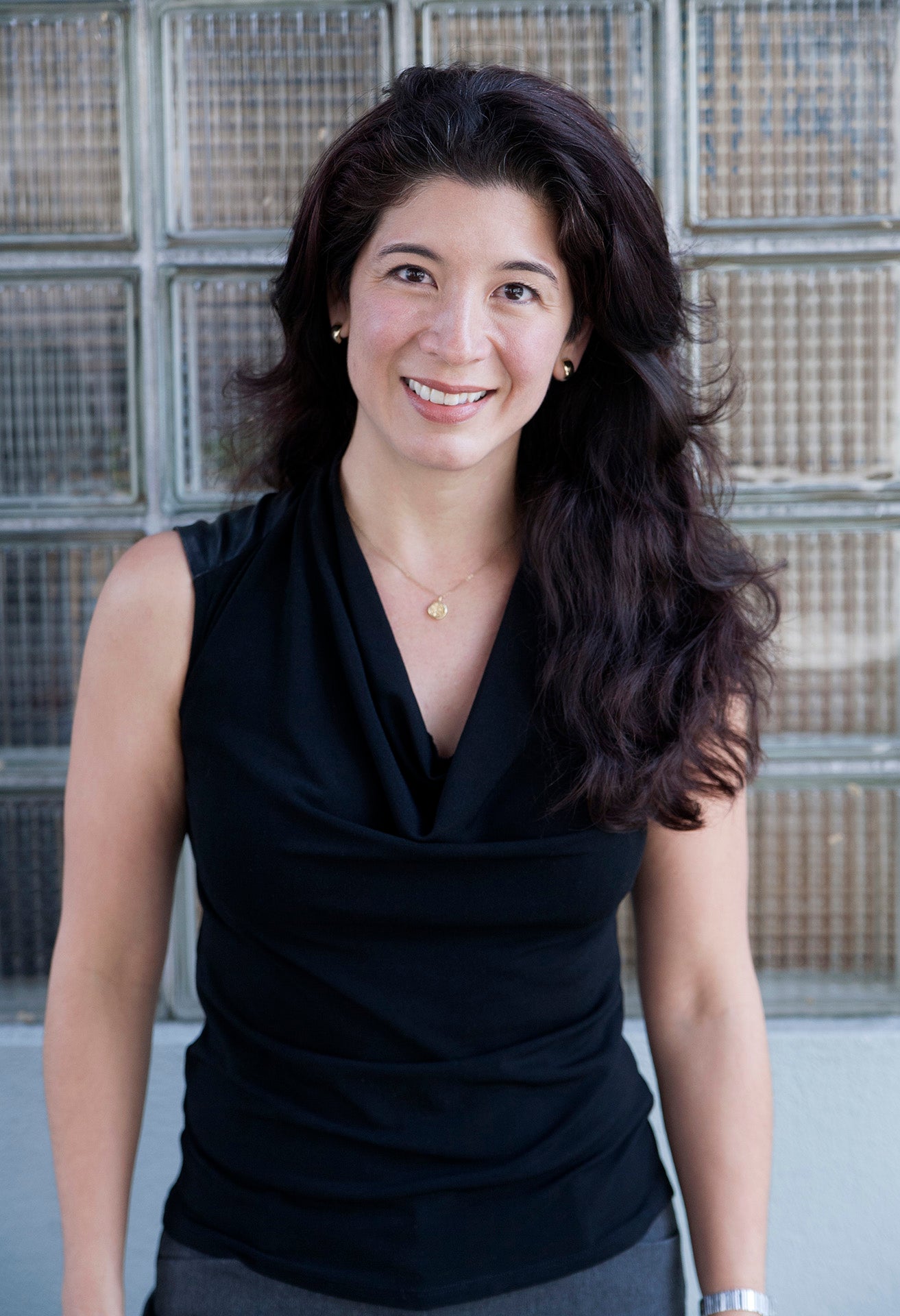 Woman with long hair smiling