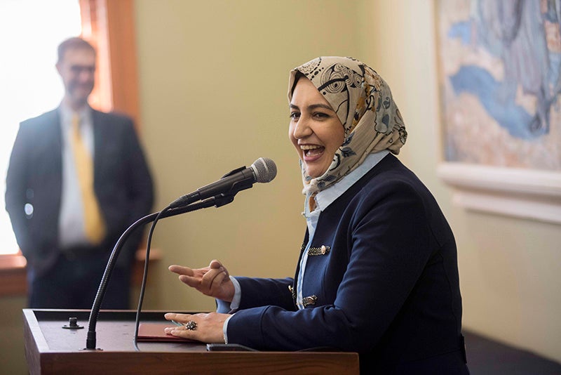 woman talking in microphone