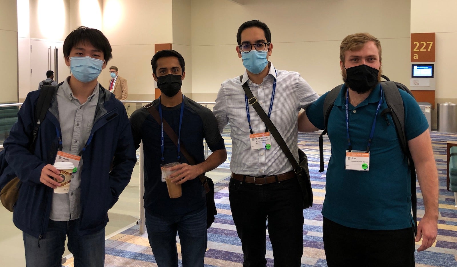 ASU faculty member Mohamend Houssem Kasbaoui with students at conference