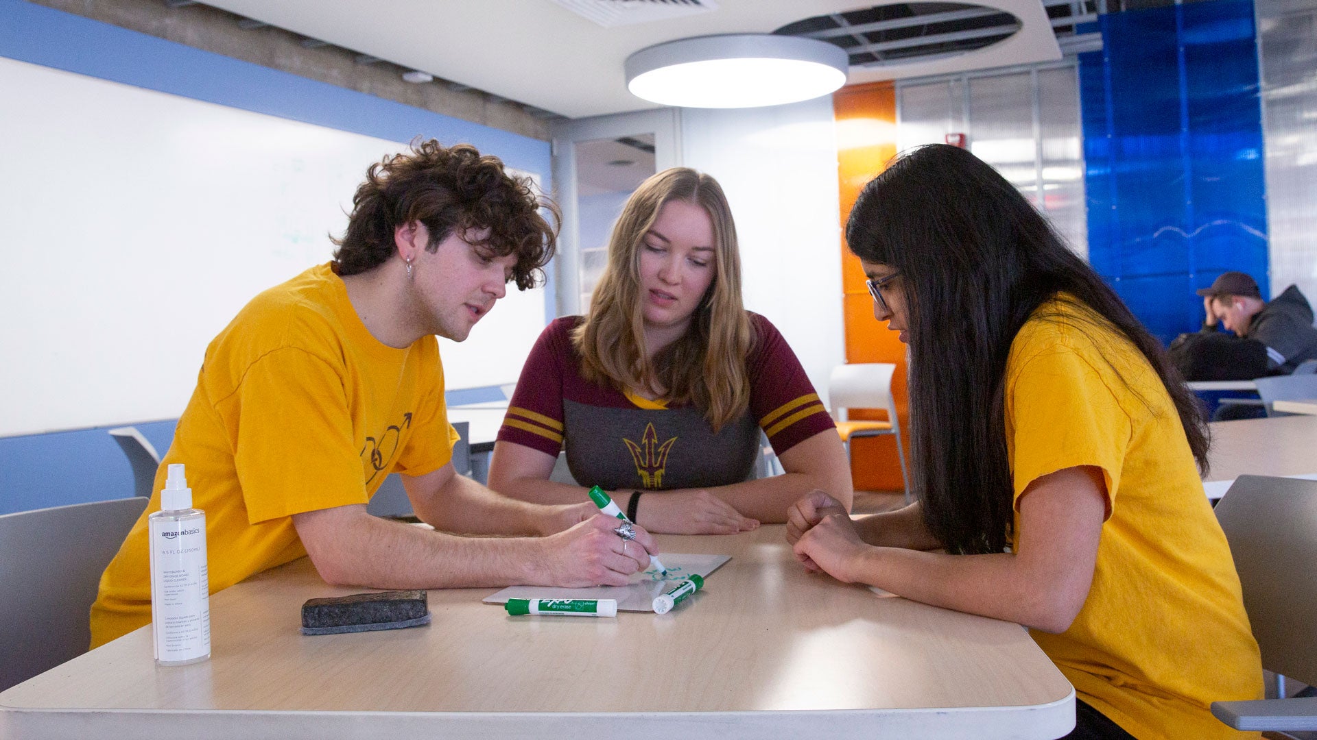 ASU biomedical engineering graduate student Daniella Pautz (center) with undergraduate students Maxwell Johnson and Ruhi Dharan.