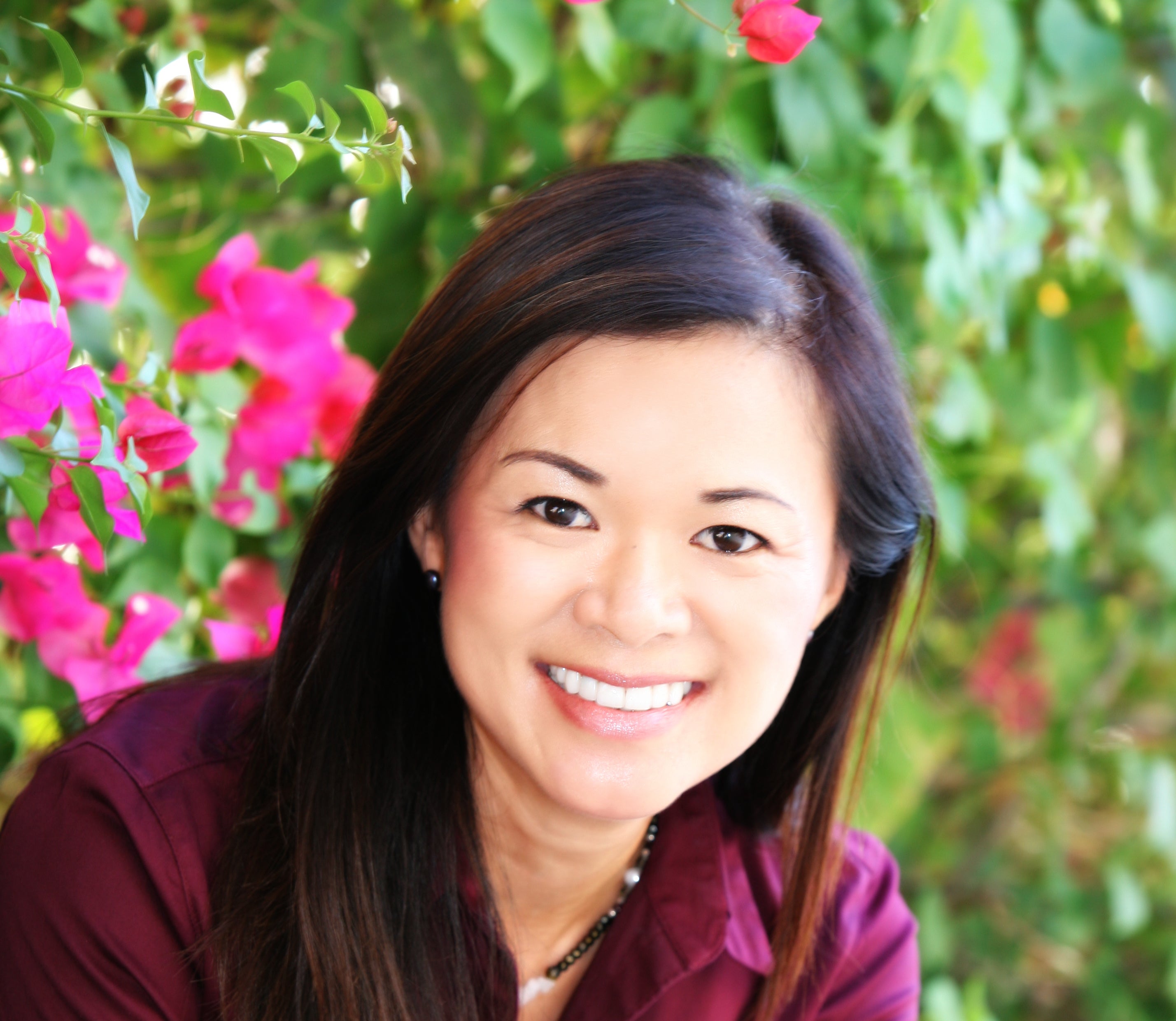 Brown haired woman in purple shirt