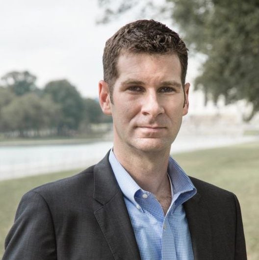 Man in blazer and oxford shirt