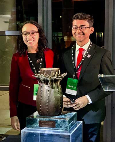 Winners of the inaugural Regents Cup debate tournament with the trophy