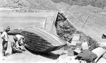 Repairing a boat: 1923 Birdseye Grand Canyon expedition