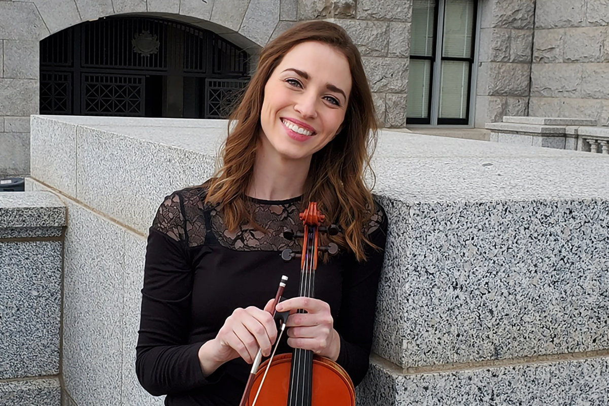 woman posing with violin