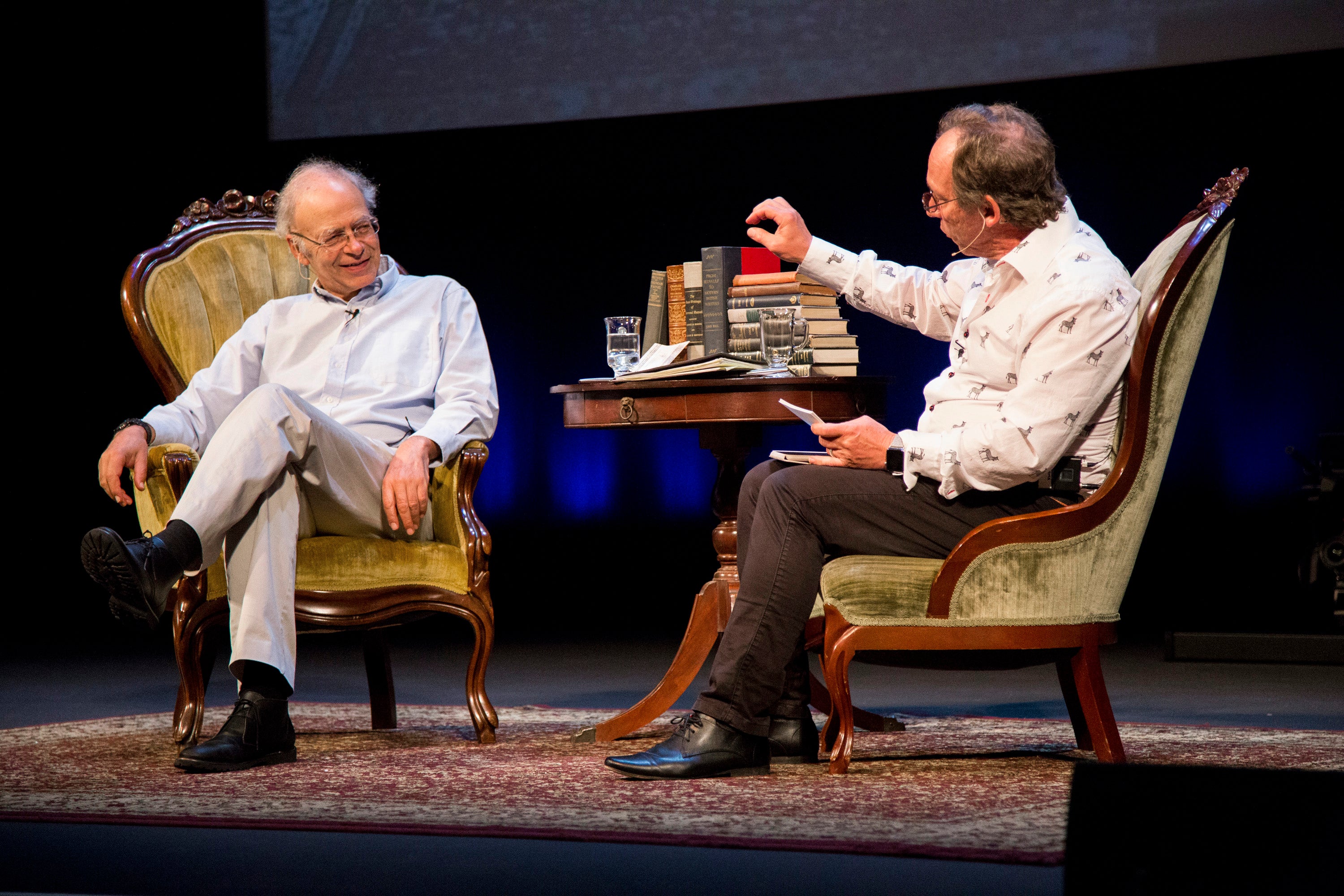 Animal-rights philosopher Peter Singer and theoretical physicist Lawrence Krauss