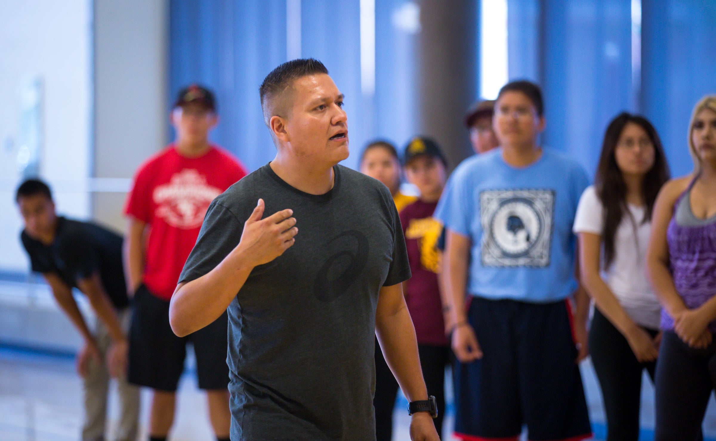 man leading fitness class