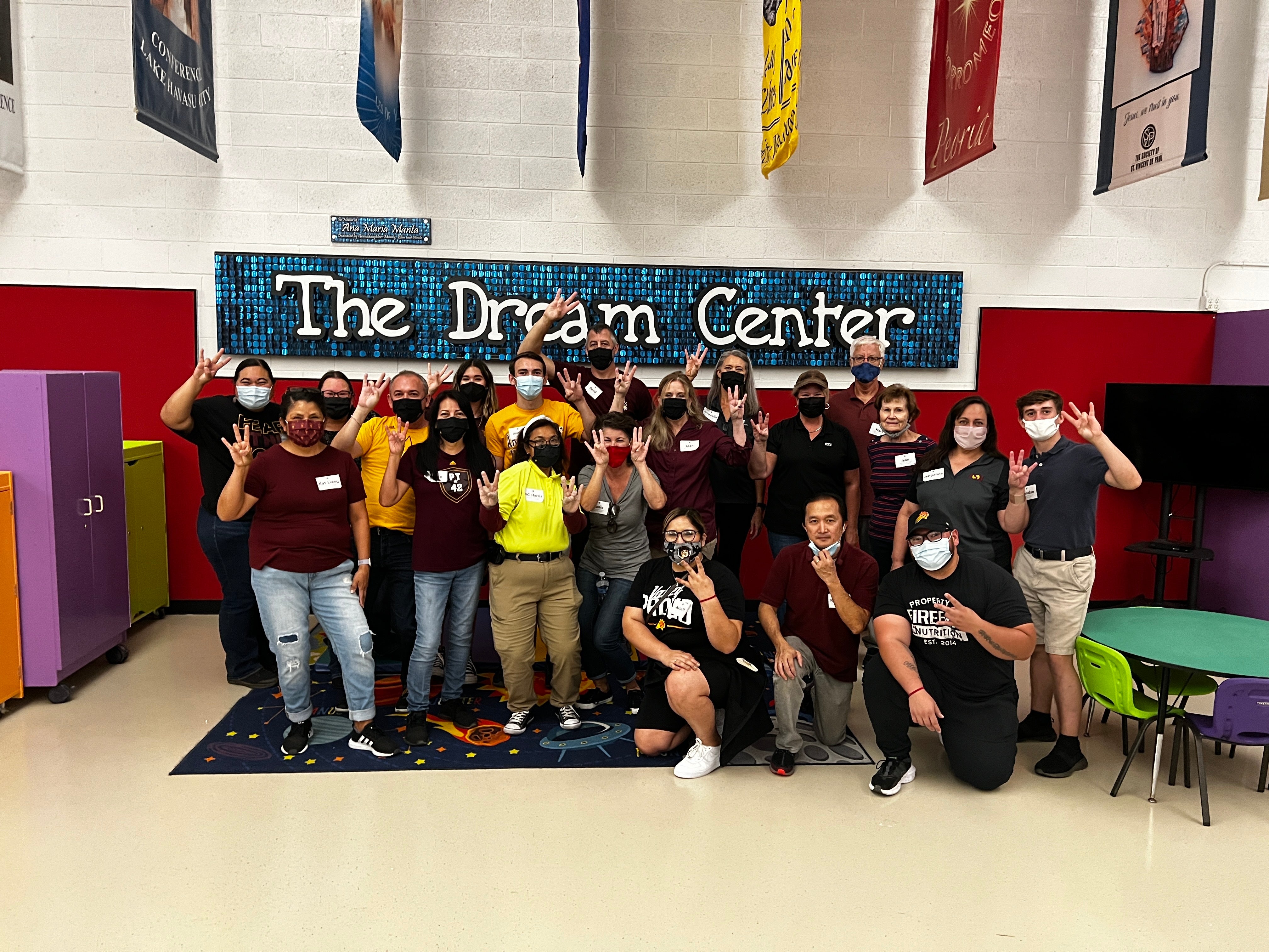 volunteers pose for a group photo at St. Vincent de Paul