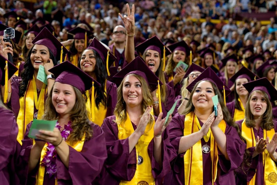 graduates celebrating at convocation