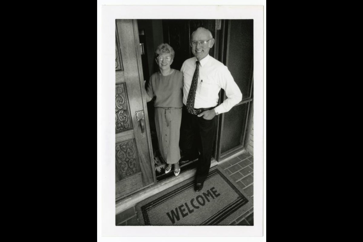 two people standing in doorway