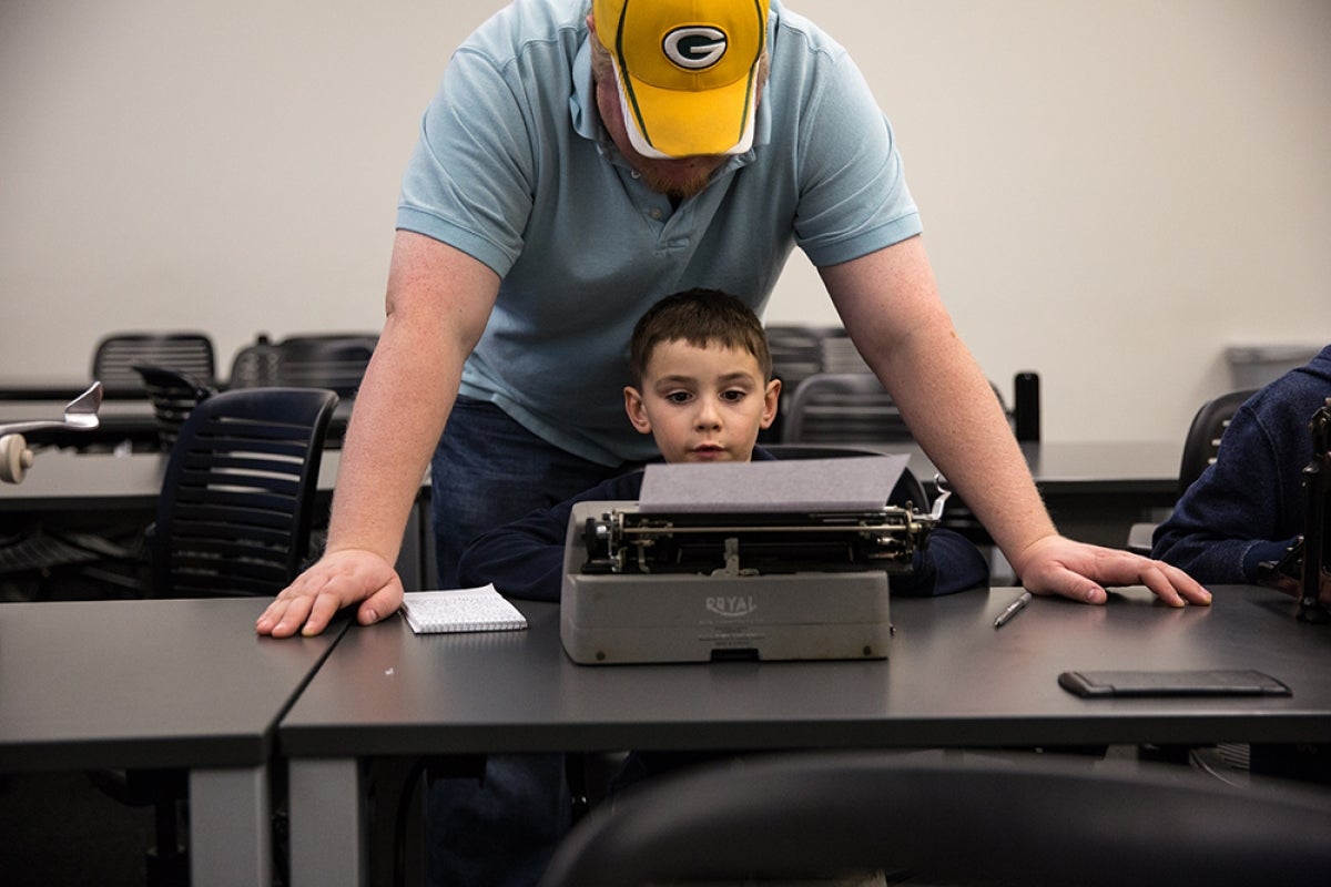 ASU Night of the Open Door Working on a typewriter