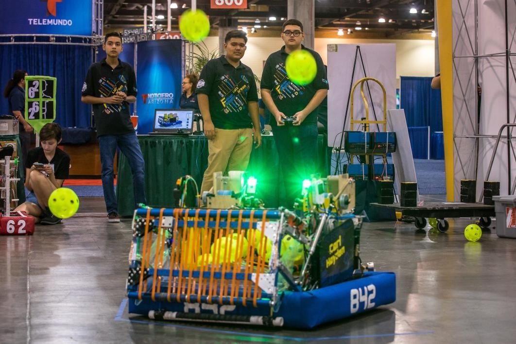 The Carl Hayden team drives their robot at National Council of La Raza