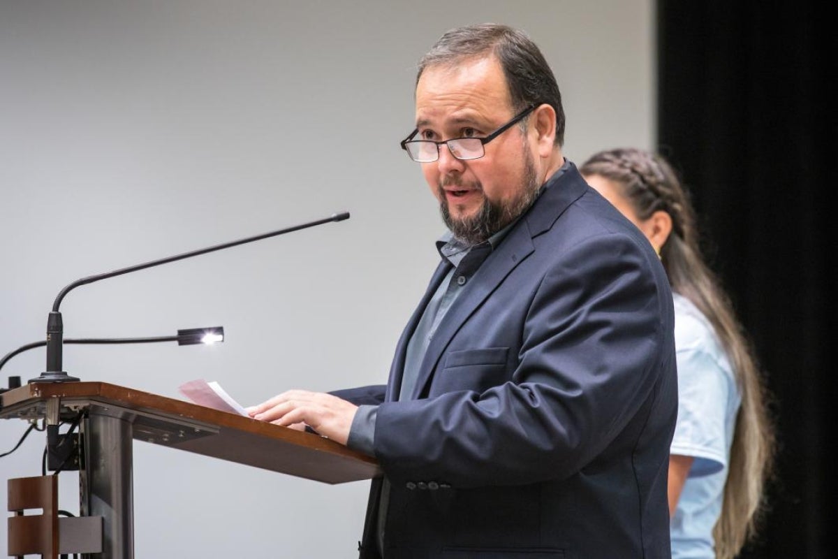 A man introduces a history panel at National Council of La Raza