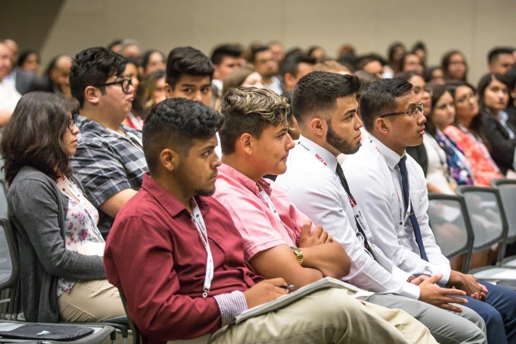 An audience listens to a history panel at National Council of La Raza