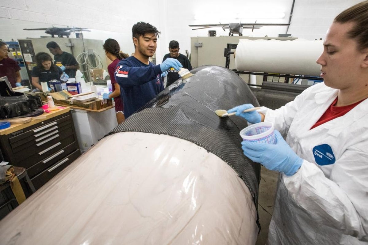 Carbon fiber is applied to the AZLoop pod mold