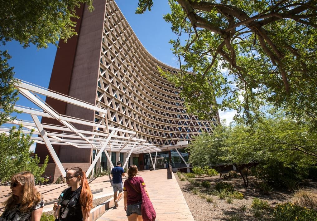 Students walk up to Manzanita residence hall