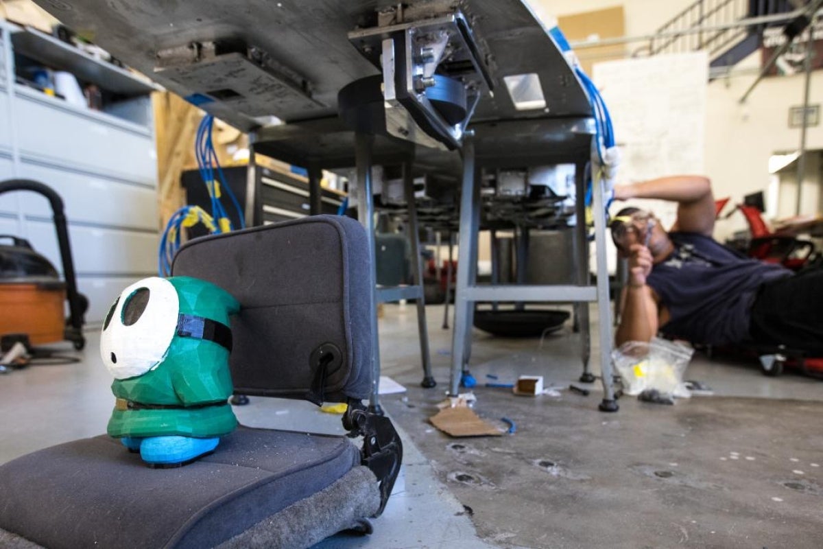 The AZLoop test dummy sits on a chair