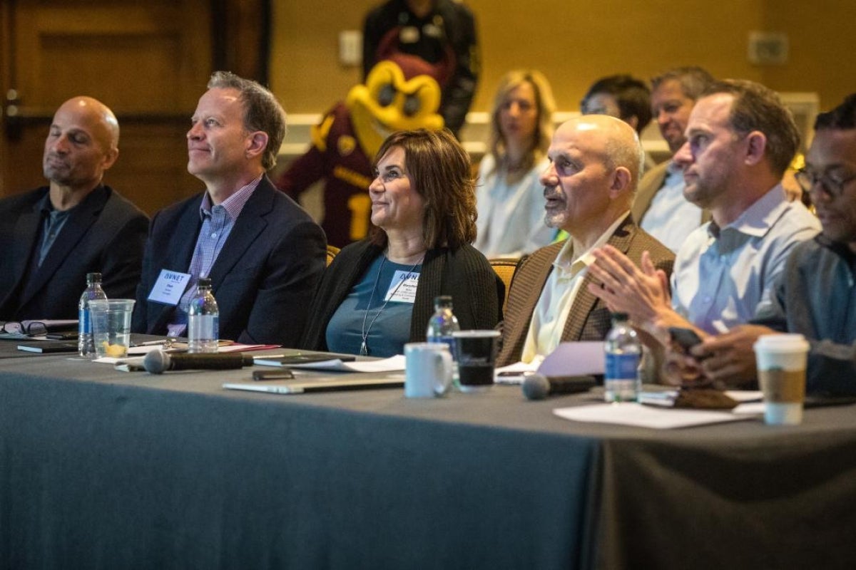 panel of people at table