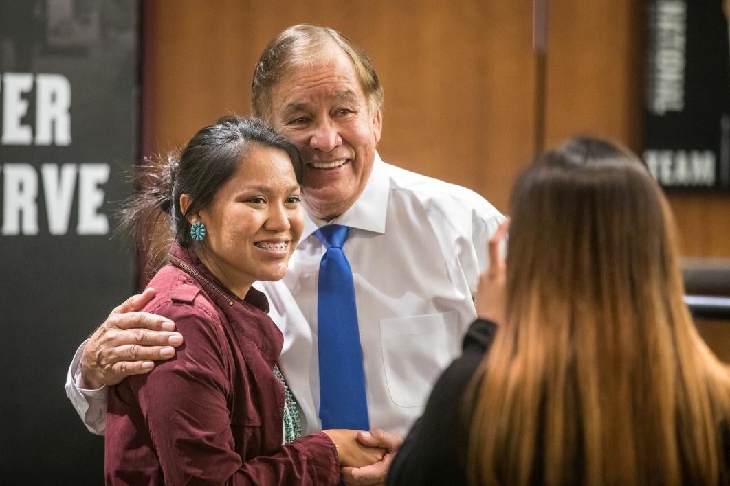 Olympian Billy Mills with a fan