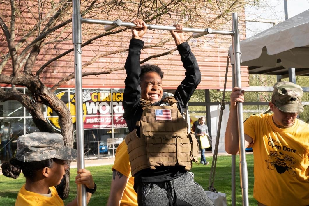 boy doing pullups