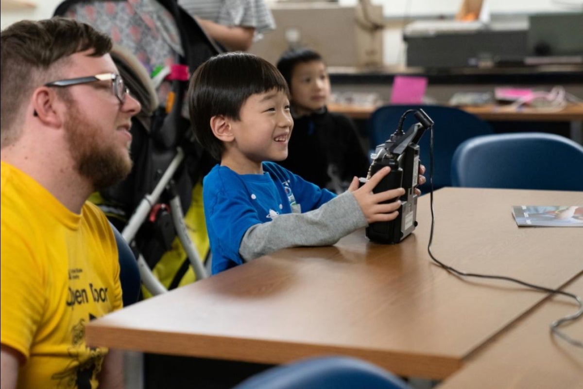 a child plays in the robotics lab at ASU open door