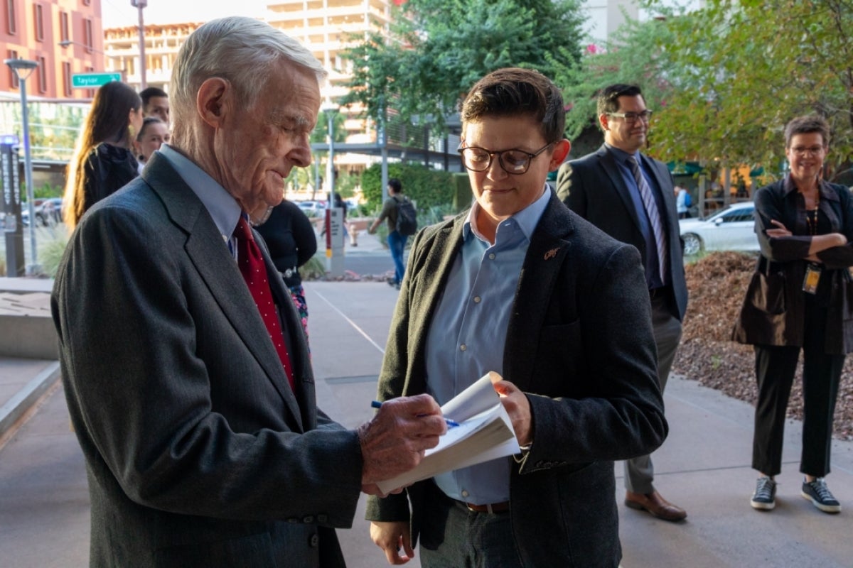 Man signing book