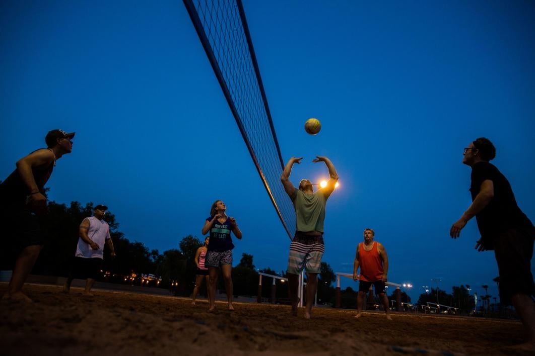 People playing volleyball.