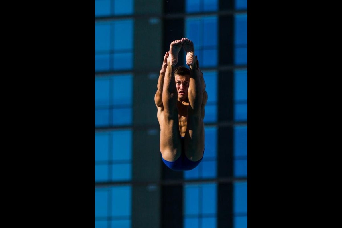 Heikki Makikallio practices his dive