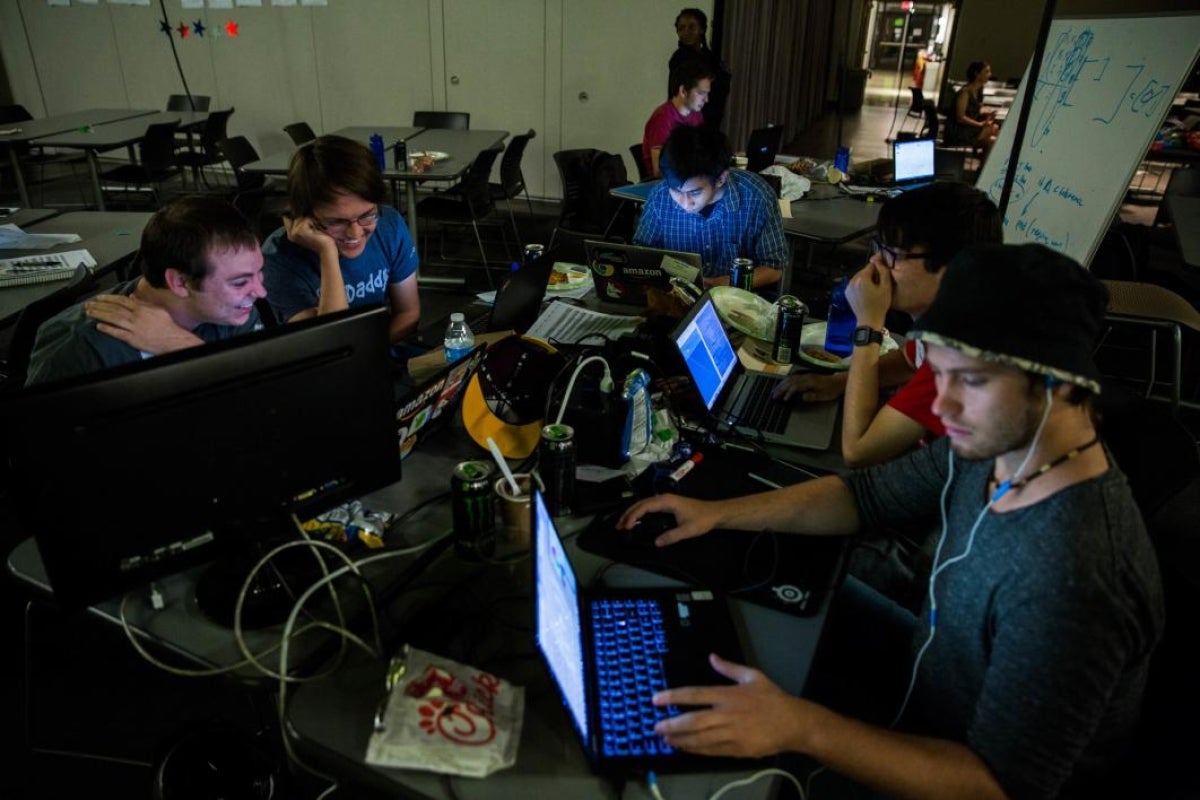 group of people working on computers